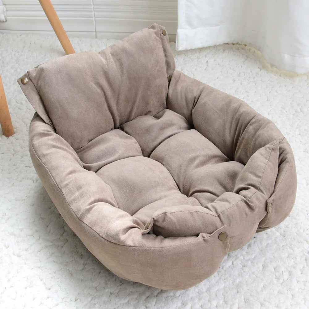 Beige pet bed on a white floor
