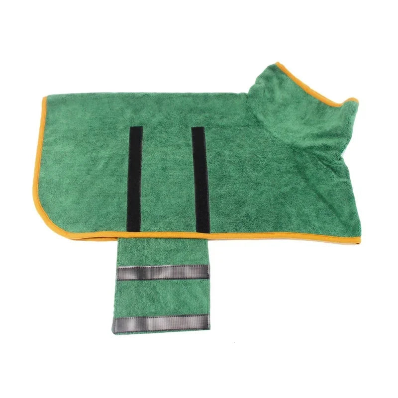 Green towel with black stripes and a yellow border on a white background
