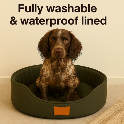 Dog sitting in a green pet bed with text 'Fully washable & waterproof lined' on a beige background