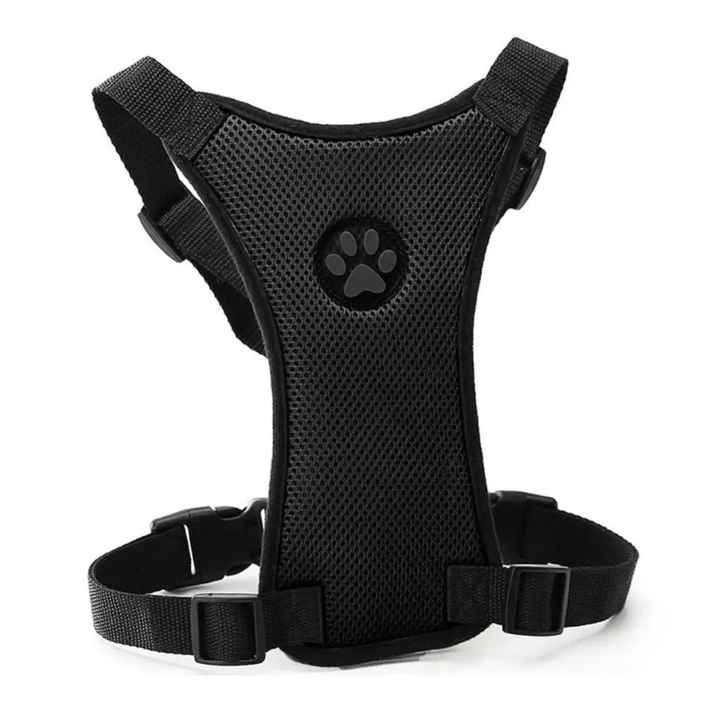 Black dog harness with a paw print on a white background